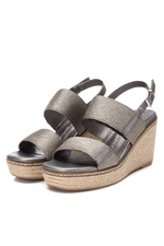 Xti Wedge Sandal. A women's wedged sandal with an adjustable buckle strap, an open toe, two silver cross foot straps, and a 7cm wedge.