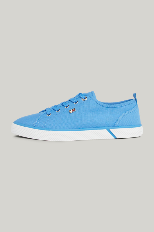 An image of the Tommy Hilfiger Enamel Flag Canvas Trainers