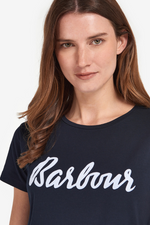 An image of a female model wearing the Barbour Otterburn T-Shirt in the colour Navy/White.