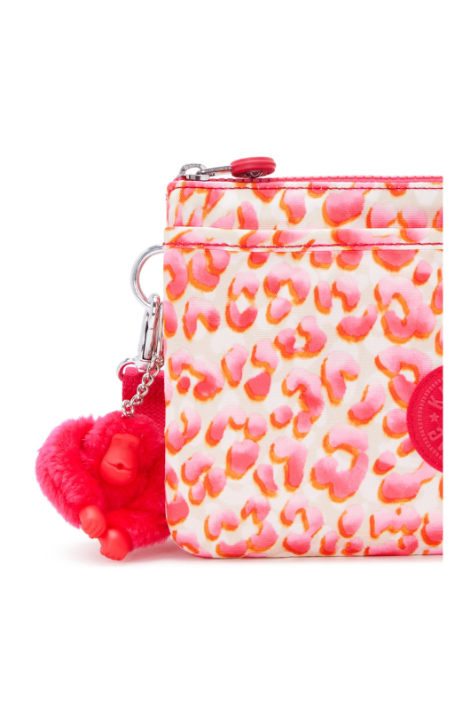 Kipling Riri Small Crossbody Bag in Latin Cheetah. A small zip bag with a pink cheetah print and a fluffy monkey keychain.