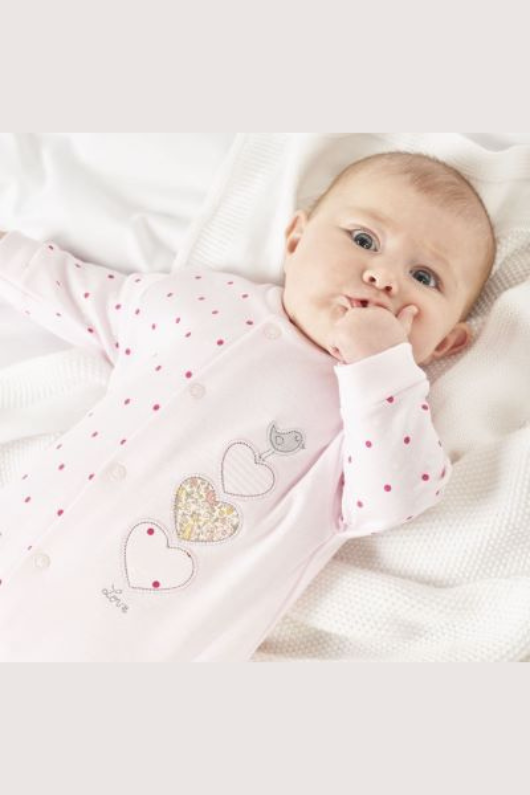 An image of the Dandelion Clothing Triple Hearts Cotton Sleepsuit