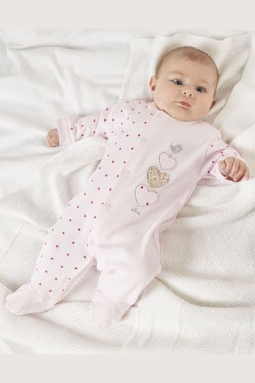 Dandelion Triple Hearts Cotton Sleepsuit. A long sleeve sleepsuit with popper closures and pink design with heart applique.