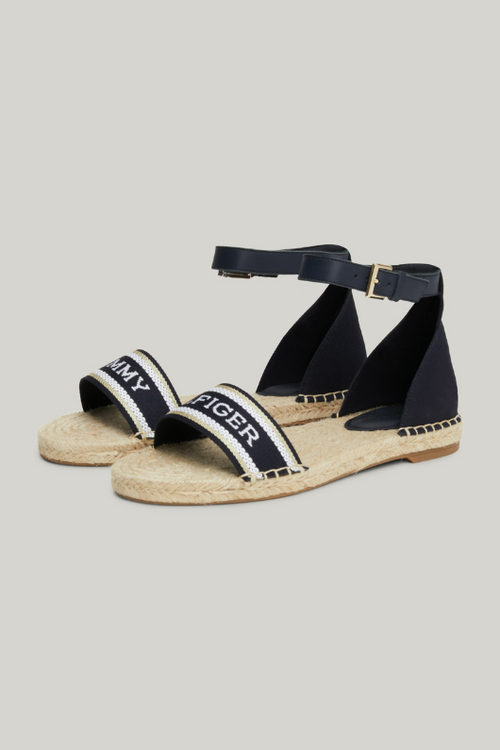 An image of the Tommy Hilfiger Monotype Webbing Strap Espadrille Sandals in the colour Space Blue.
