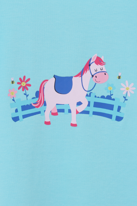 Lighthouse Causeway Swing Tee. A regular fit, kids t-shirt with short ruffle trim sleeves, a crew neck, and a sweet pony design on a light blue background.