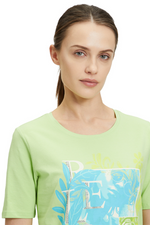 An image of a female model wearing the Betty Barclay Basic T-Shirt in the colour Green Mint.