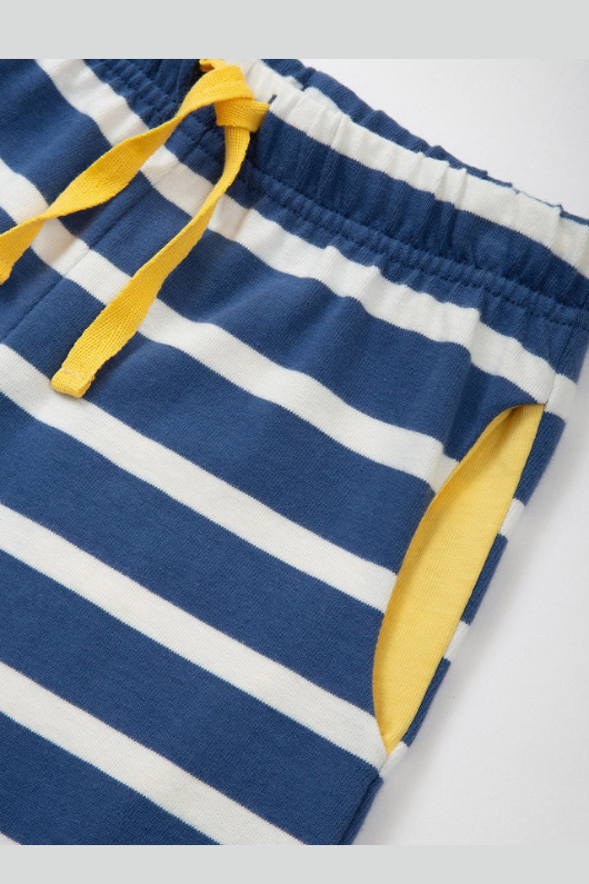 Kite Corfe Shorts. A pair of navy and white striped shorts with contrasting yellow pockets, elasticated waistband, and adjustable tie.