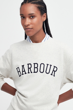 An image of a female model wearing the Barbour Northumberland Sweatshirt in the colour Cloud/Navy.