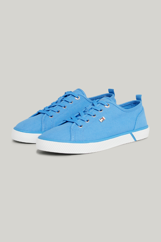 An image of the Tommy Hilfiger Enamel Flag Canvas Trainers