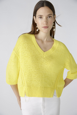 Oui 3/4 Sleeve Jumper. A yellow boxy fit jumper with 3/4 length sleeves, V-neckline, and split hem.