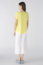 Oui Plain Cap Sleeve T-Shirt. A yellow top with short sleeves, wide neck, and split hem.