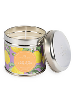 A candle with tin packaging and lemon label, with notes of lemon, lime, mandarin, spearmint, and jasmine.