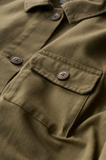 An image of the Seasalt Far Horizon Organic Jacket in the colour Laurel.