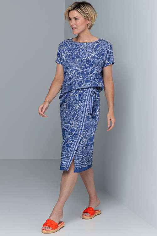 An image of a female model wearing the Bianca Smilla Patterned Skirt in the colour Blue White.
