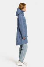 Didriksons Thelma Parka 10. A fully waterproof and windproof jacket with a feminine drawstring waist, pockets, a two-way adjustable hood, and front zip fastening