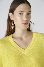 Oui 3/4 Sleeve Jumper. A yellow boxy fit jumper with 3/4 length sleeves, V-neckline, and split hem.