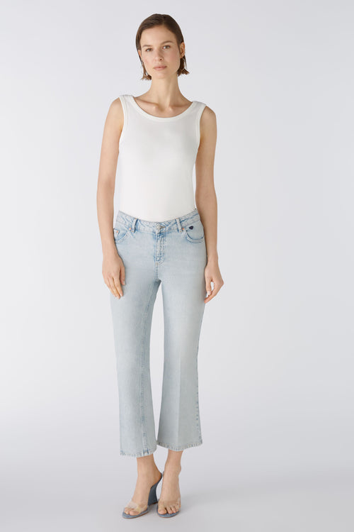 An image of a female model wearing the Oui Faded Look Jeans in the colour Blue Denim.