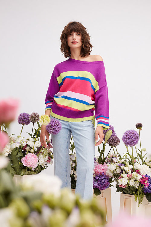 Oui Tie Sides Jumper. This jumper has a casual cut and regular length, alongside 3/4 length sleeves, round neck with overcut shoulder, tie side detail, and a bold striped print in pink, purple, blue and green.