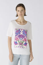 Oui Floral Motif T-Shirt. A casual cut, regular length T-shirt featuring half sleeves, a multicoloured floral motif, and slits and embroidery at the hem.