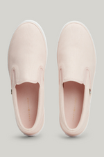 An image of the Tommy Hilfiger Enamel Flag Slip-On Canvas Trainers