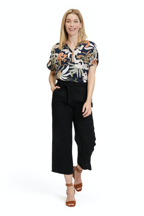 An image of the Betty Barclay Floral Blouse with short sleeves and notch neck.