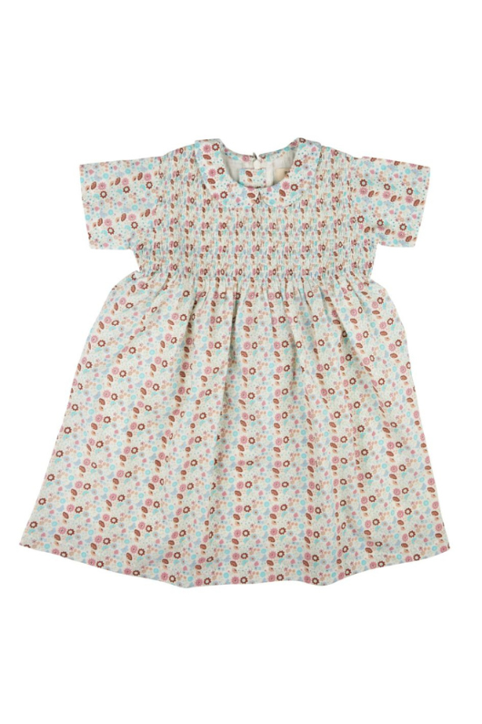 Pigeon Organics Smock Peter Pan Collar Dress. A dress with short sleeves, peter pan collar, and smocking in a multi-coloured floral print.