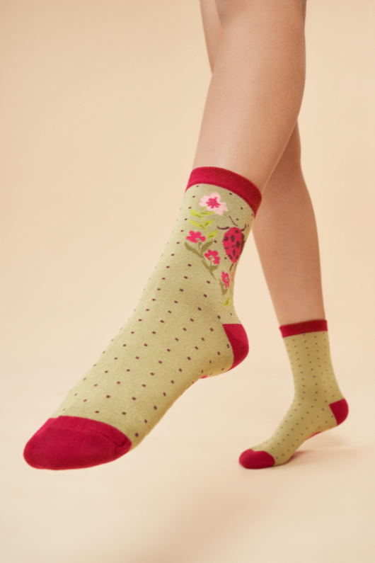 Powder Ankle Socks in sage ladybird design