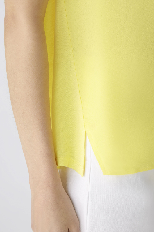 Oui Plain Cap Sleeve T-Shirt. A yellow top with short sleeves, wide neck, and split hem.