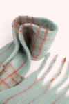 An image of the Powder Angelica Cosy Scarf - Ice/Tangerine