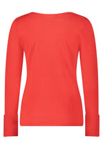 An image of the Betty Barclay Fine Knit Top in red, with long sleeves featuring a button detail.