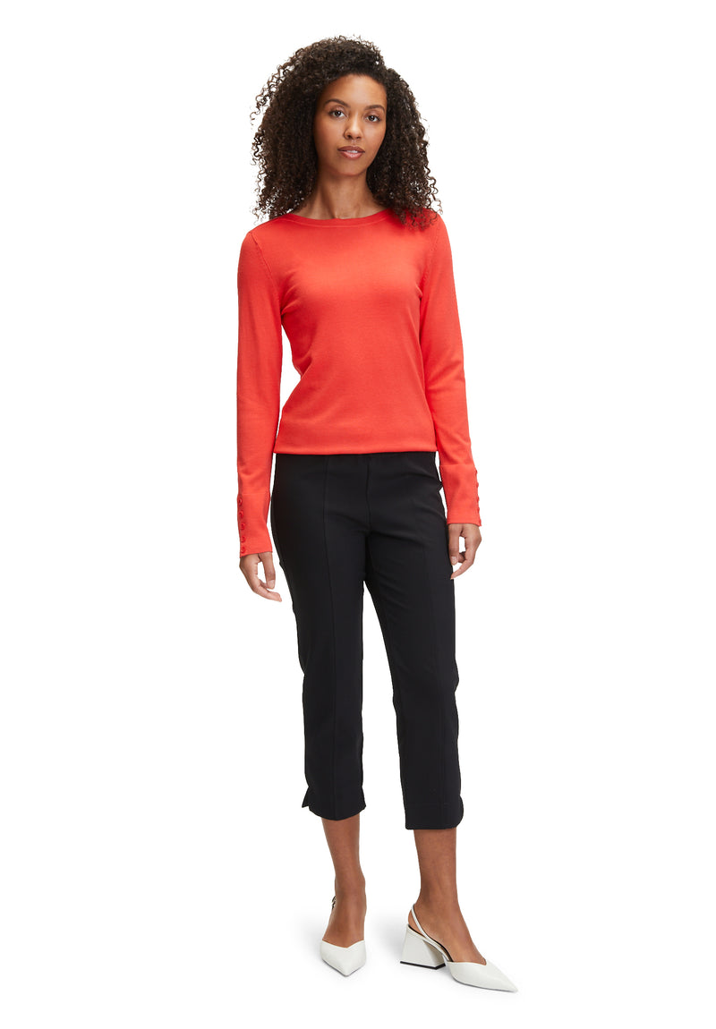 An image of the Betty Barclay Fine Knit Top in red, with long sleeves featuring a button detail.