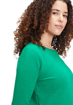 An image of the Betty Barclay Jersey Waffle Top in green, with 3/4 length sleeves and boat neck.