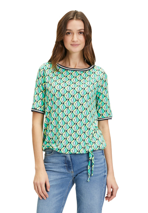 Betty Barclay Short Sleeve Pattern Top. A figure-skimming top with mid-length sleeves, a bateau neckline and an eye-catching graphic print.