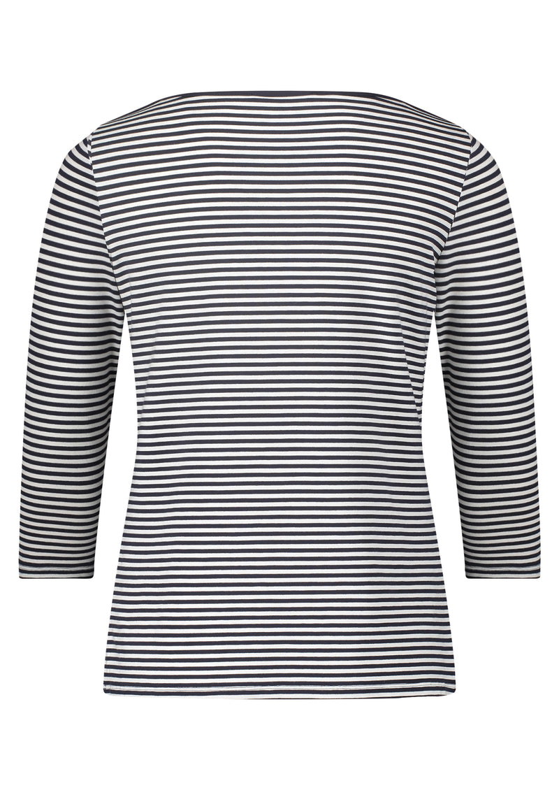 This Betty Barclay Striped Top has a bateau neckline and 3/4 length sleeves. This top is slightly fitted and has a dark blue and white striped pattern.