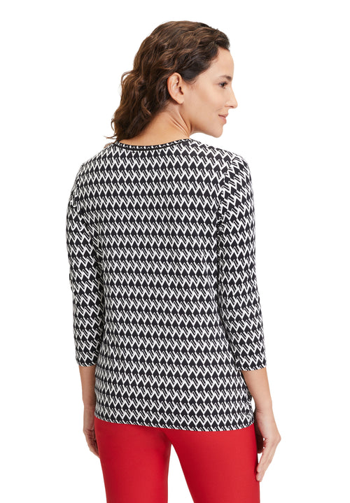 An image of the Betty Barclay 3/4 Sleeve Patterned Top, featuring a black and white print.