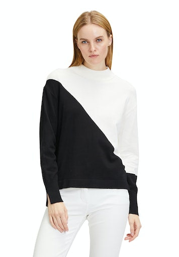 An image of the Betty Barclay Diagonal split jumper, in black and white.