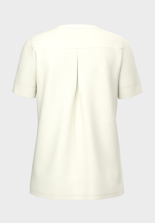 Bianca Paja Short Sleeve Blouse. Short sleeved blouse with V-neckline in the colour cream.