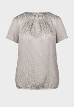 Bianca Darin Blouse. A short sleeve satin finish blouse with subtle print in beige mix.