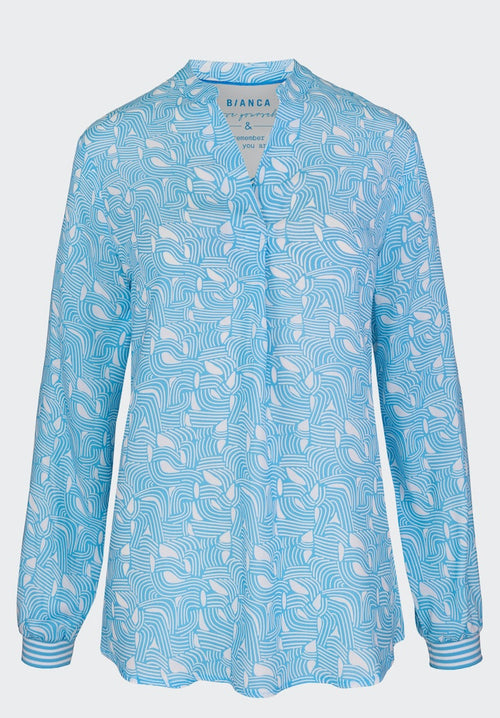 Bianca Alin Long Sleeve Shirt. A regular fit with side-slit design, vibrant blue and white pattern and viscose material.