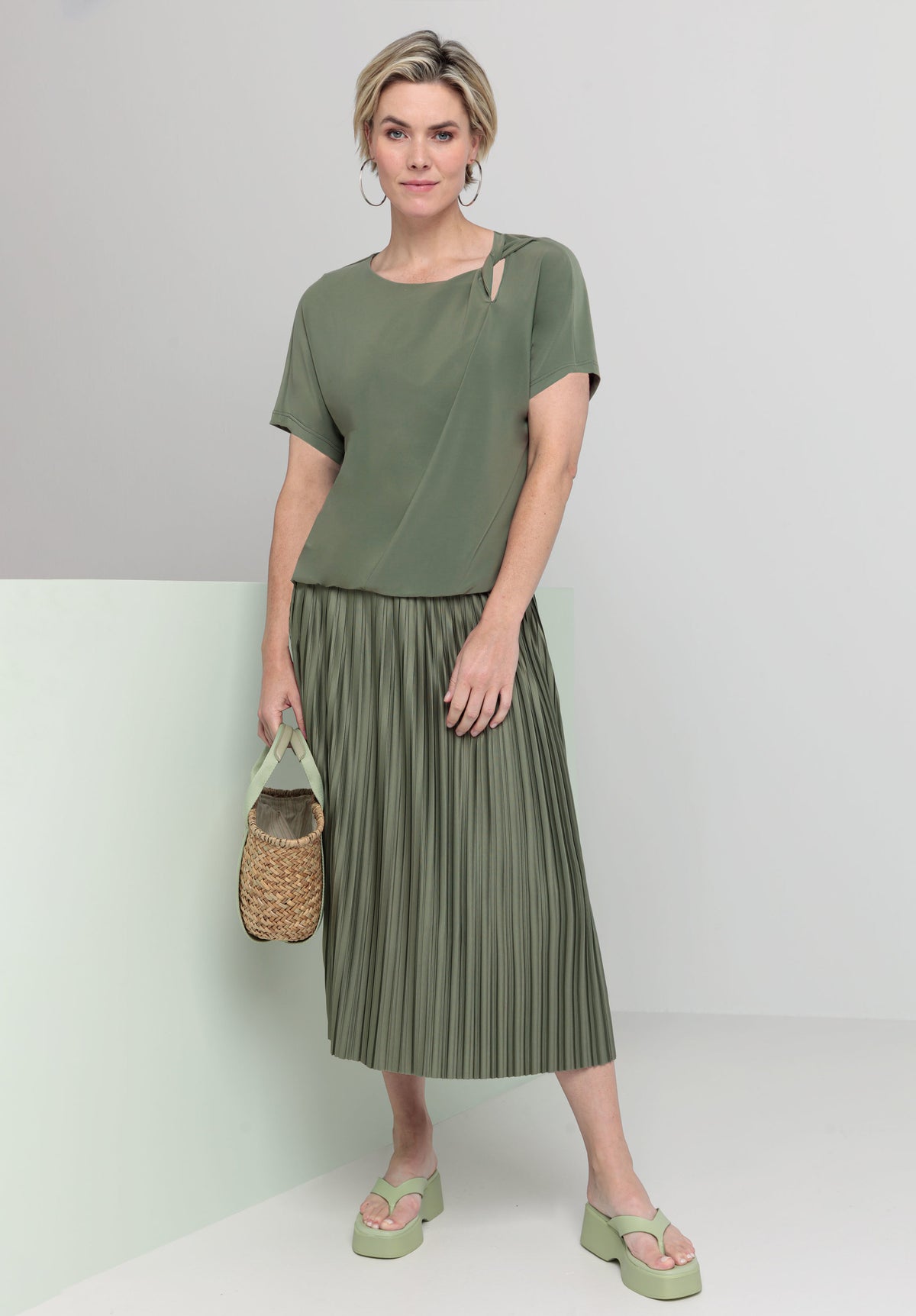 An image of the Bianca Cap Sleeve Twist Sia Top