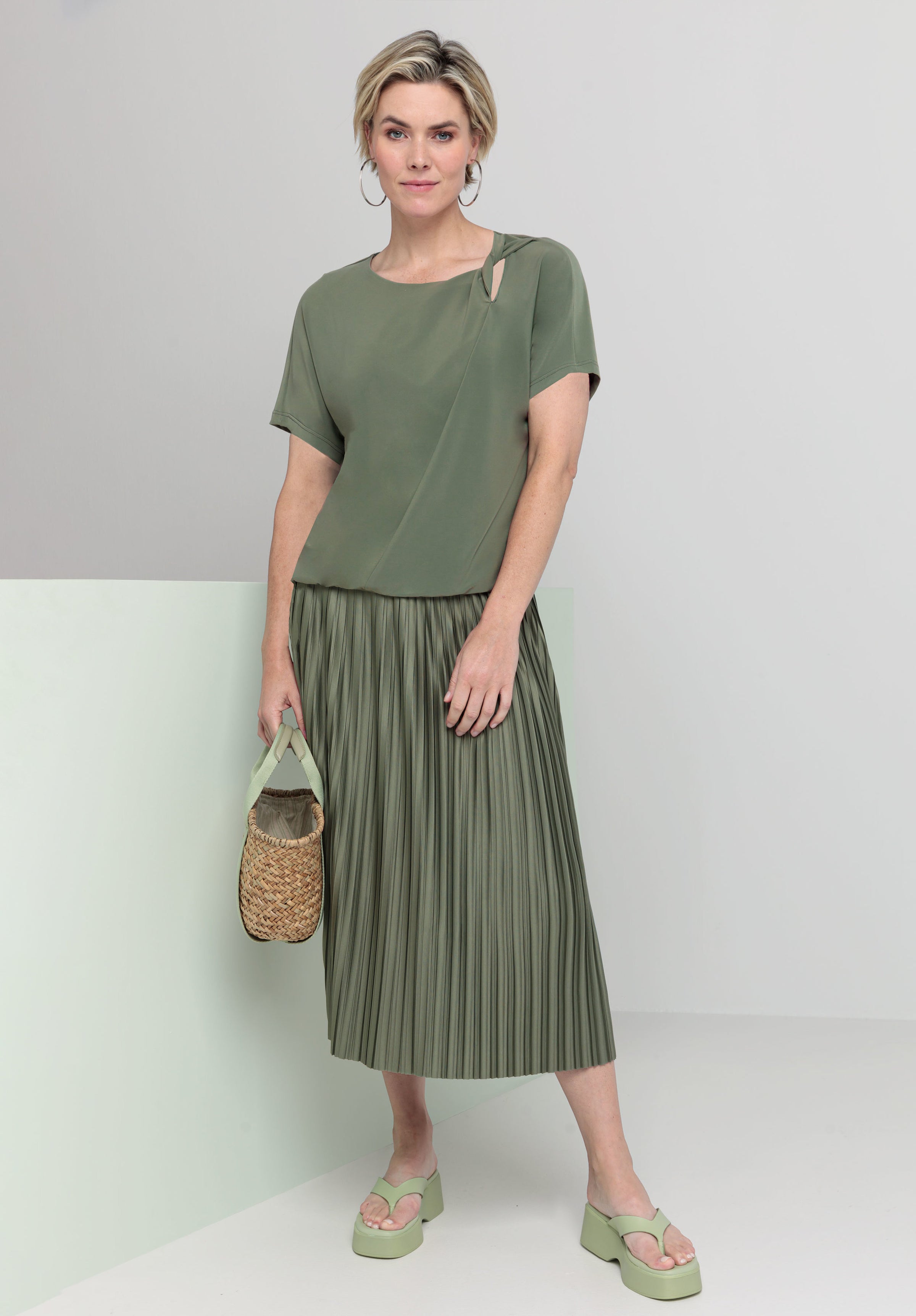 An image of the Bianca Cap Sleeve Twist Sia Top