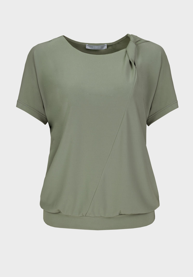 Bianca Cap Sleeve Twist Sia Top. A short sleeve, regular fit top with round neckline and twist detail, in the colour palm.