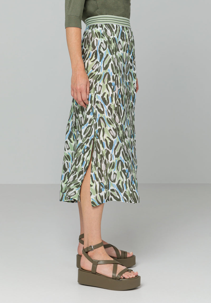 Bianca Button Through Skirt - Kina. A midi length skirt with buttons, in green animal print with a contrasting striped waistband.