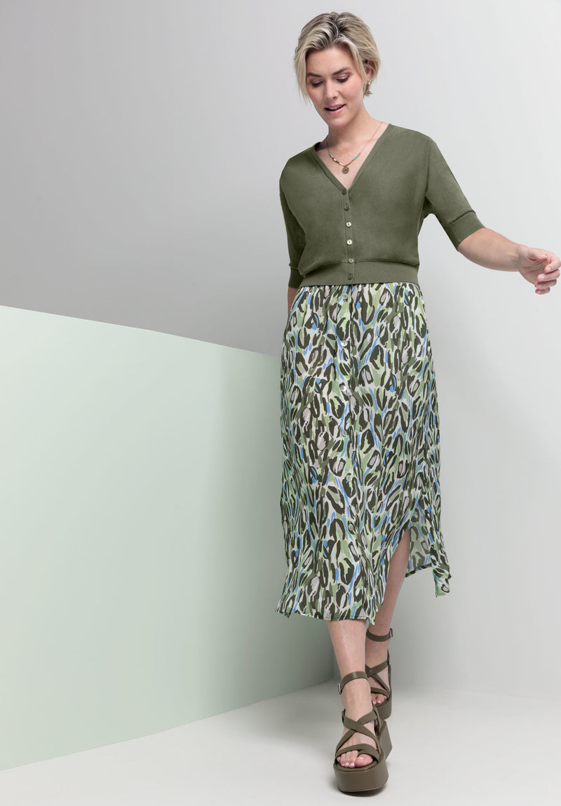 Bianca Button Through Skirt - Kina. A midi length skirt with buttons, in green animal print with a contrasting striped waistband.