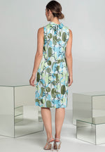 Bianca Dolores Dress. A midi length sleeveless dress with high neckline and retro green and blue print.