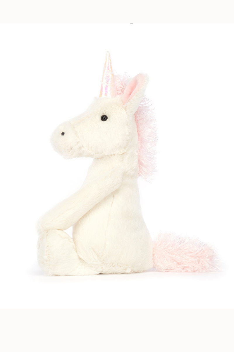 Jellycat Bashful Unicorn. A soft toy unicorn with sparkling horn and soft white and pink fur.