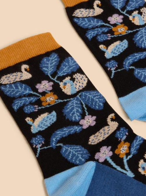 White Stuff Swan Socks. Organic cotton mix ankle socks with an orange hem, purple toe, blue heel, and a colourful swan & floral print.