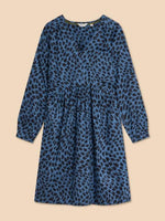 White Stuff Penelope Eco Vero Dress. A knee length dress with long sleeves, a V-neck and a pretty blue design with black patches all-over