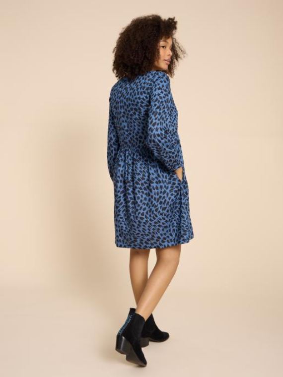 White Stuff Penelope Eco Vero Dress. A knee length dress with long sleeves, a V-neck and a pretty blue design with black patches all-over