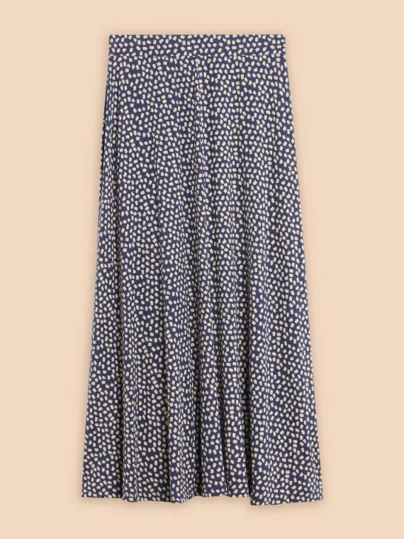 White Stuff Jada Eco Vero Skirt. A maxi skirt with flowy style and an all-over white dotted design on a navy background.
