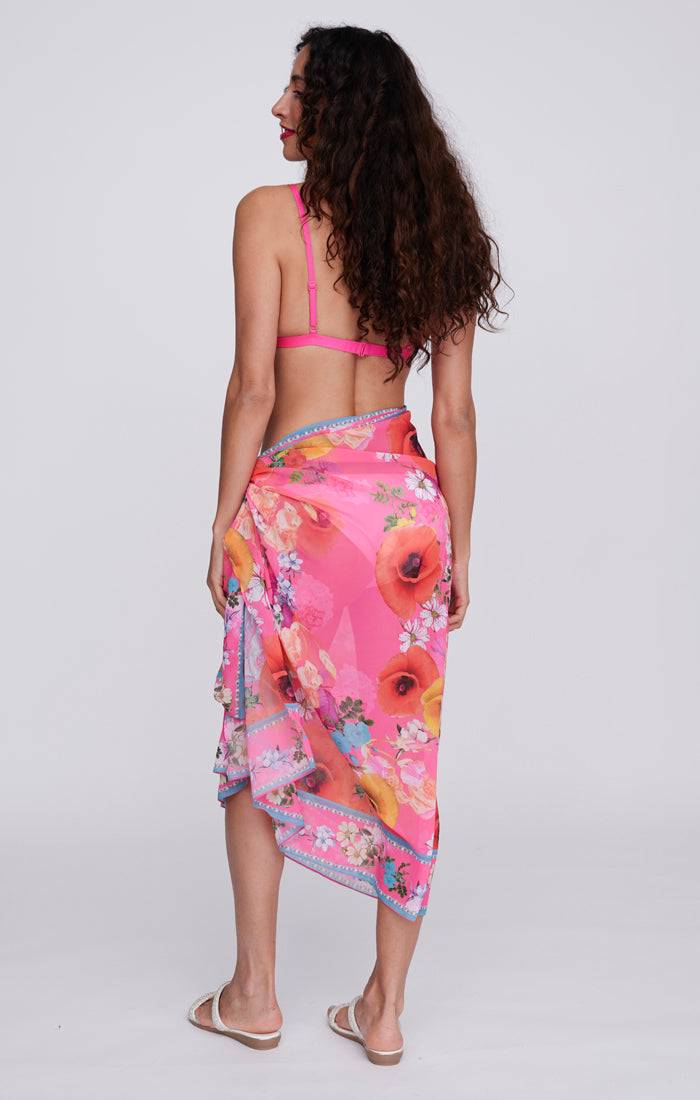 Pia Rossini Copacabana Sarong. A lightweight pink sarong with floral print.